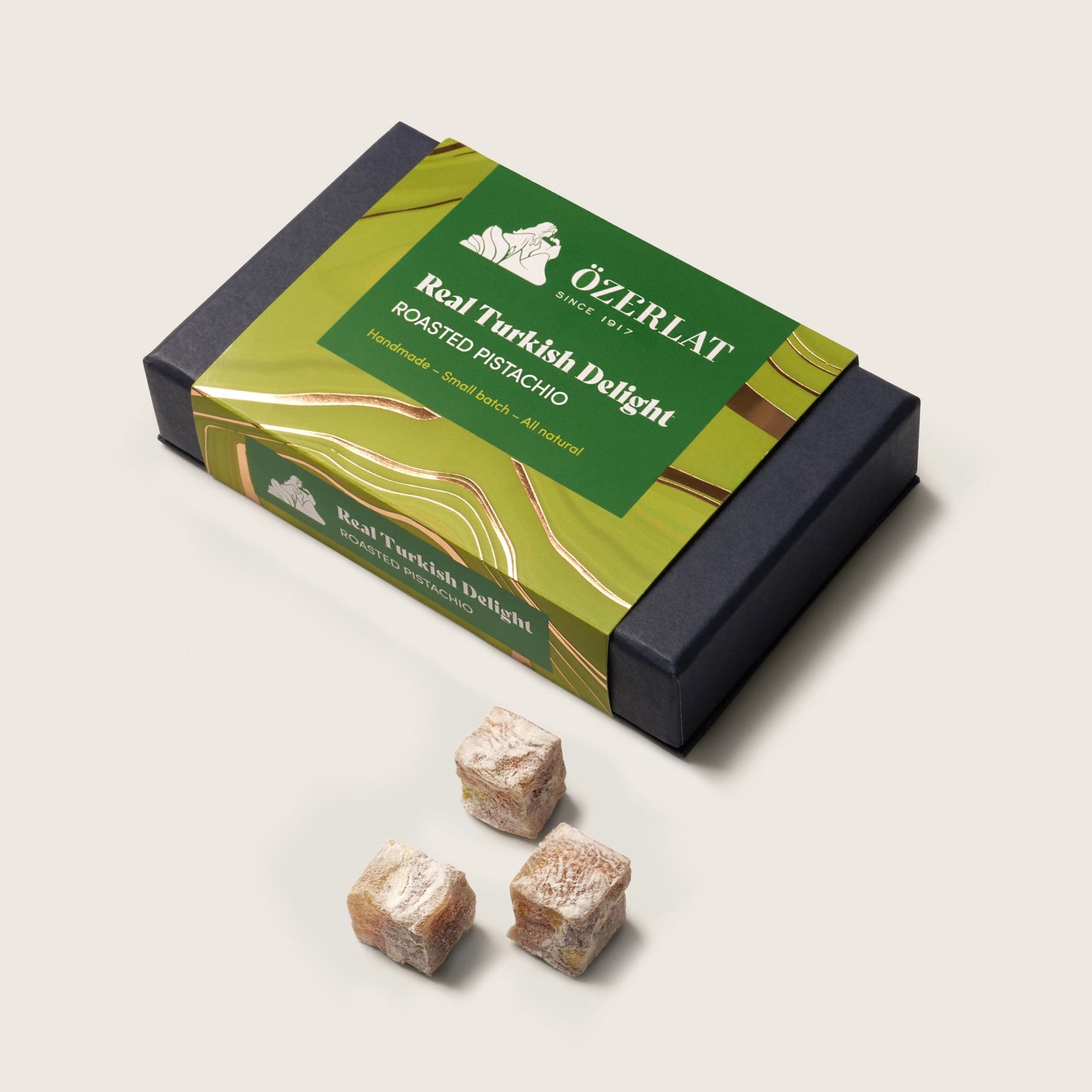 Box of Uzeylat roasted pistachio Turkish delight on a light beige background