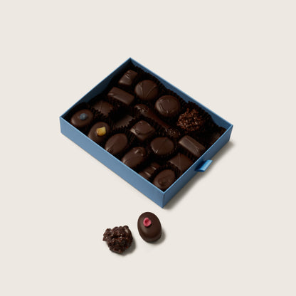 Box of chocolates on a light beige background