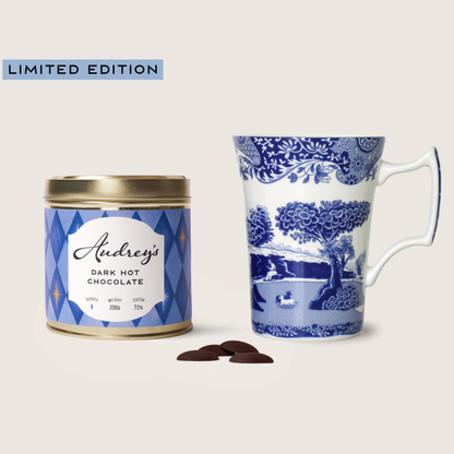 Audrey's dark hot chocolate tin and a decorative mug on a white background