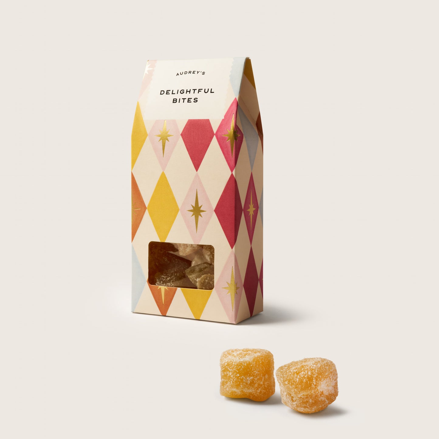 Packaged snacks with a decorative box on a white background