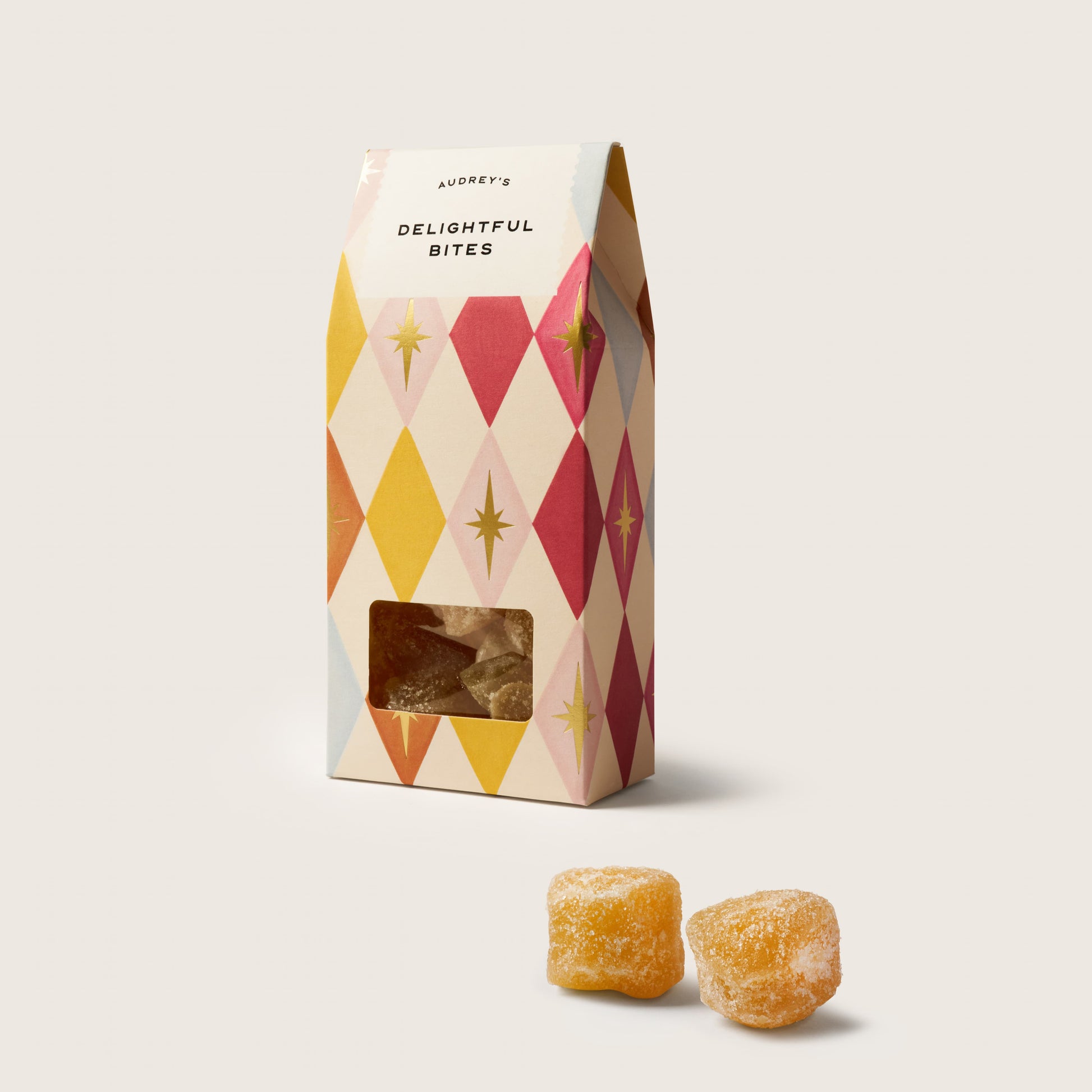 Packaged snacks with a decorative box on a white background
